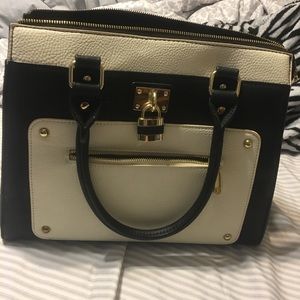 Black and white faux leather purse